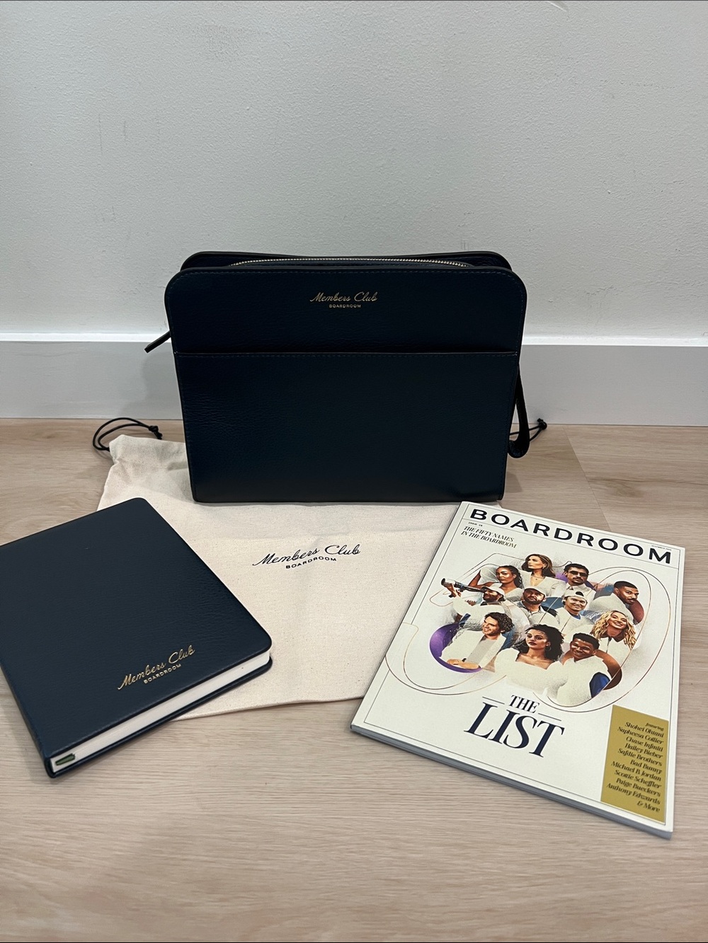 BOARDROOM Member-Exclusive Leather Pouch, Notebook, Dust Bag & Magazine